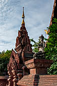 Chiang Mai - The Wat Phan Tao temple, detail of the stone torana at the entrance. 